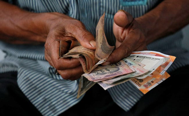 Rupee Ends Lower At 69.80 Against Dollar