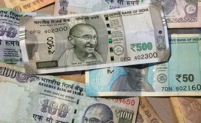 Rupee Ends Lower At 69.58 Against Dollar