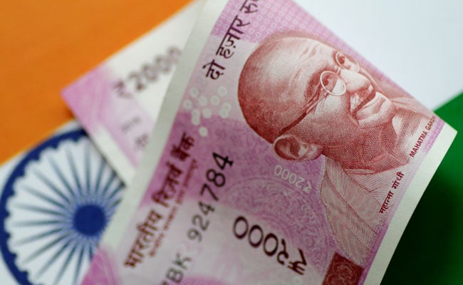 Rupee Settles Flat At 71.07 Against Dollar