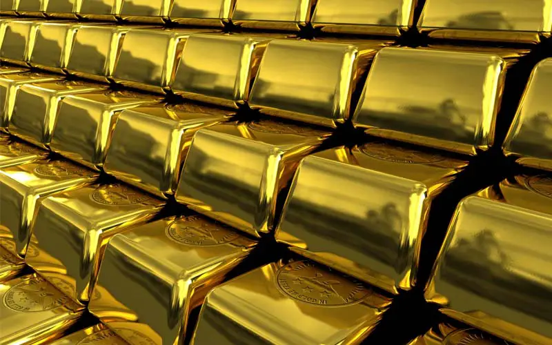 El precio del oro cae por fortalecimiento del dólar y bonos del Tesoro de EEUU